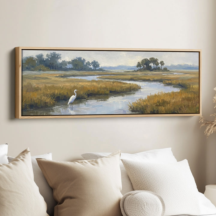 Long Narrow Wall Art Egret in a Salt Marsh for Living Room canvas in an oak frame, above the bed