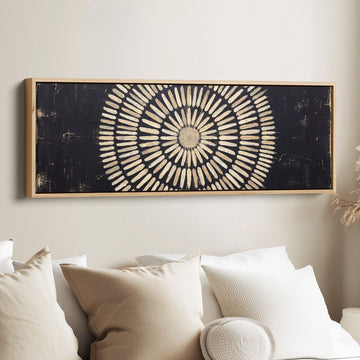 Long Narrow Wall Art Radial Mandala Pattern for Hallway canvas in an oak frame, above the bed