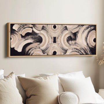 Neutral Brushstroke Arcs Pattern Long Narrow Wall Art Above Couch canvas in an oak frame, above the bed