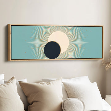 Horizontal Wall Art Aqua Celestial Eclipse Sun and Moon for Living Room canvas in an oak frame, above the bed