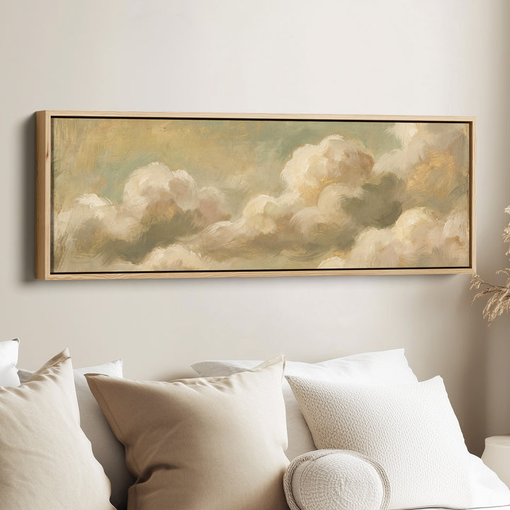 Soft Romantic Cream Clouds Long Wall Art Above Bed canvas in an oak frame, above the bed