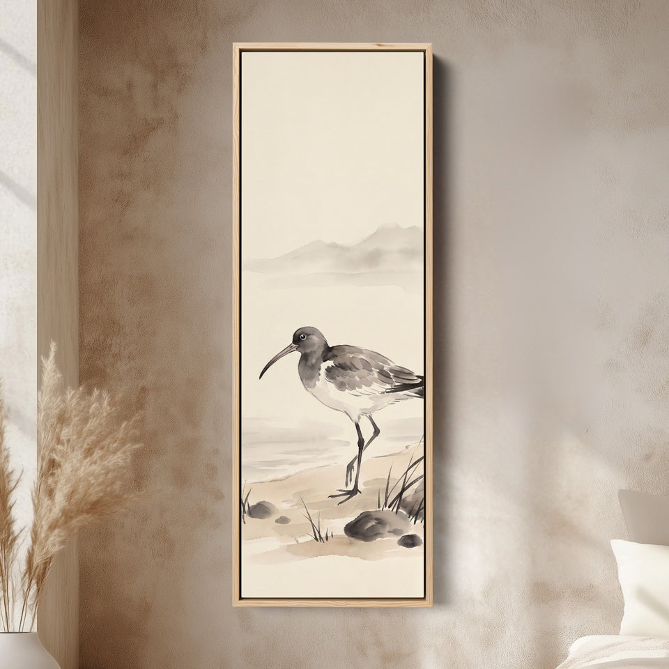 Quiet Coastal Curlew on the Shore Tall Narrow Wall Art for Bedroom canvas in an oak frame, above the bed in a modern bedroom