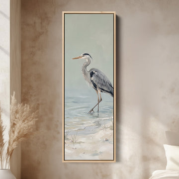 Grey Heron Wading Tall Wall Art Coastal Canvas for Living Room canvas in an oak frame, above the bed in a modern bedroom