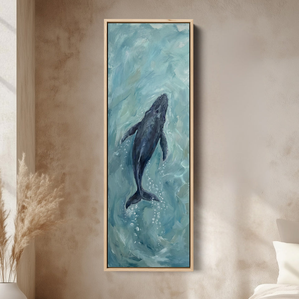 Deep Blue Ocean Diving Whale Long Narrow Wall Art for Bedroom canvas in an oak frame, above the bed in a modern bedroom