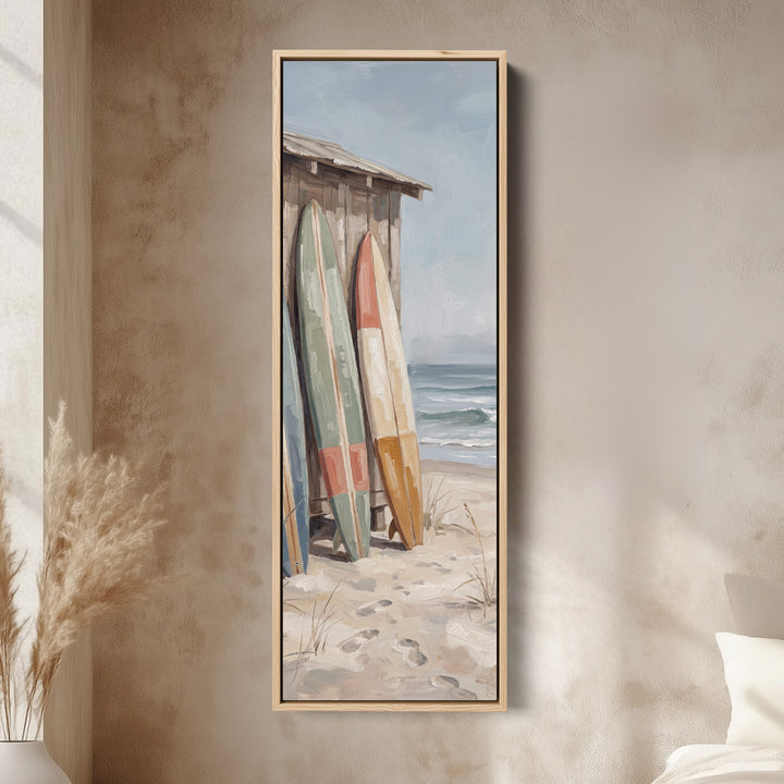 Surfboards by the Beach Shack Vertical Wall Art for Hallway canvas in an oak frame, above the bed in a modern bedroom