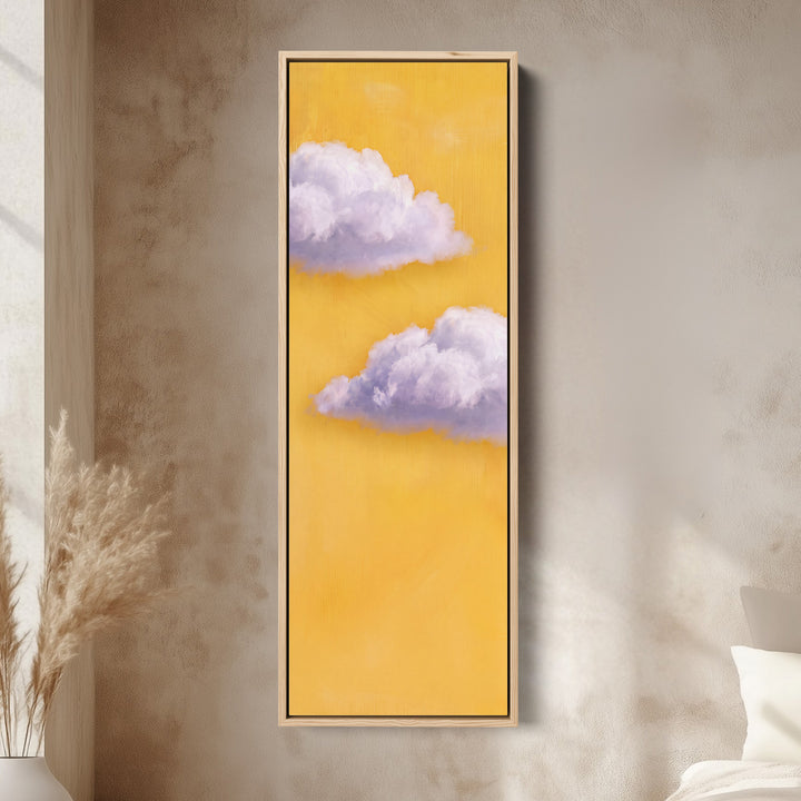 Vertical Wall Art Lilac Clouds on Yellow for Kids Room canvas in an oak frame, above the bed in a modern bedroom