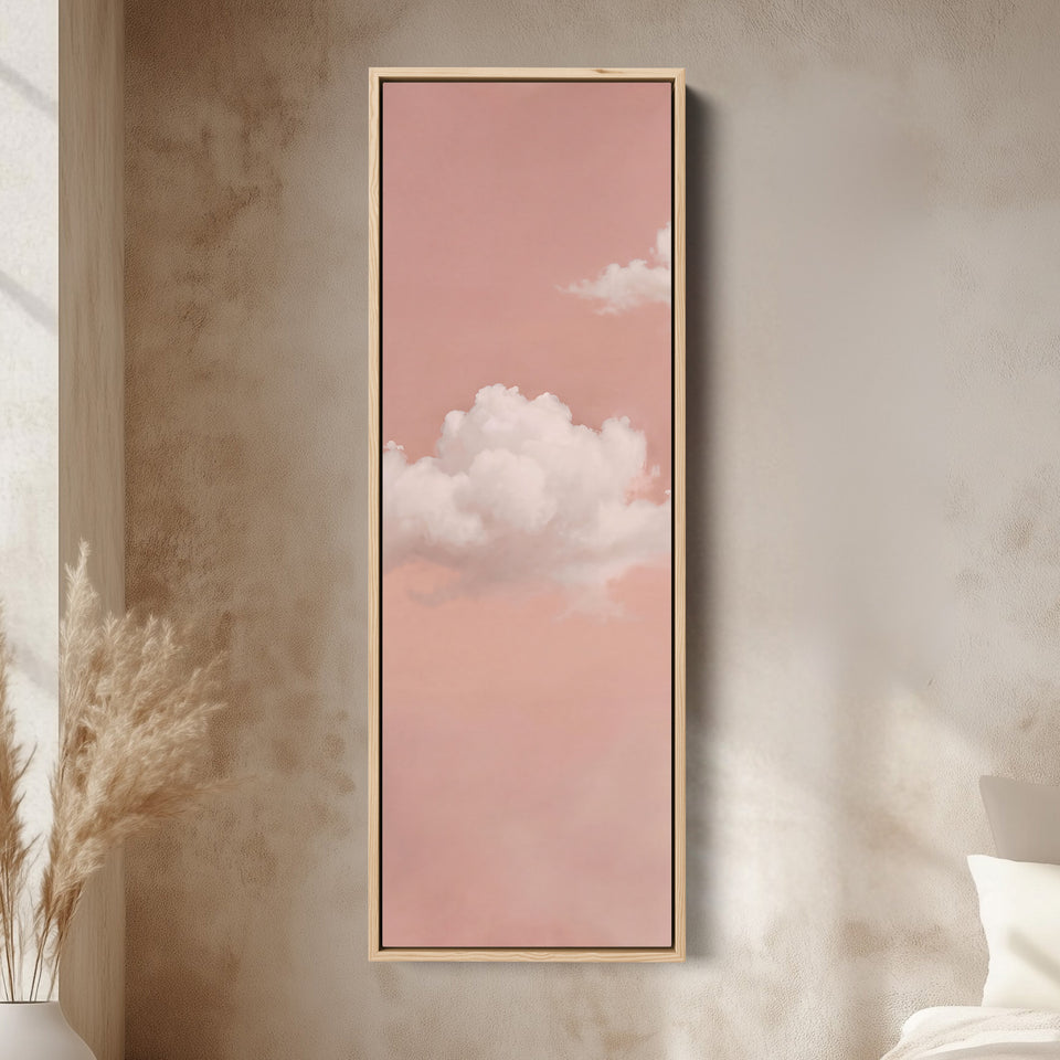 Clouds on Blush Pink Tall Wall Art for Bedroom canvas in an oak frame, above the bed in a modern bedroom