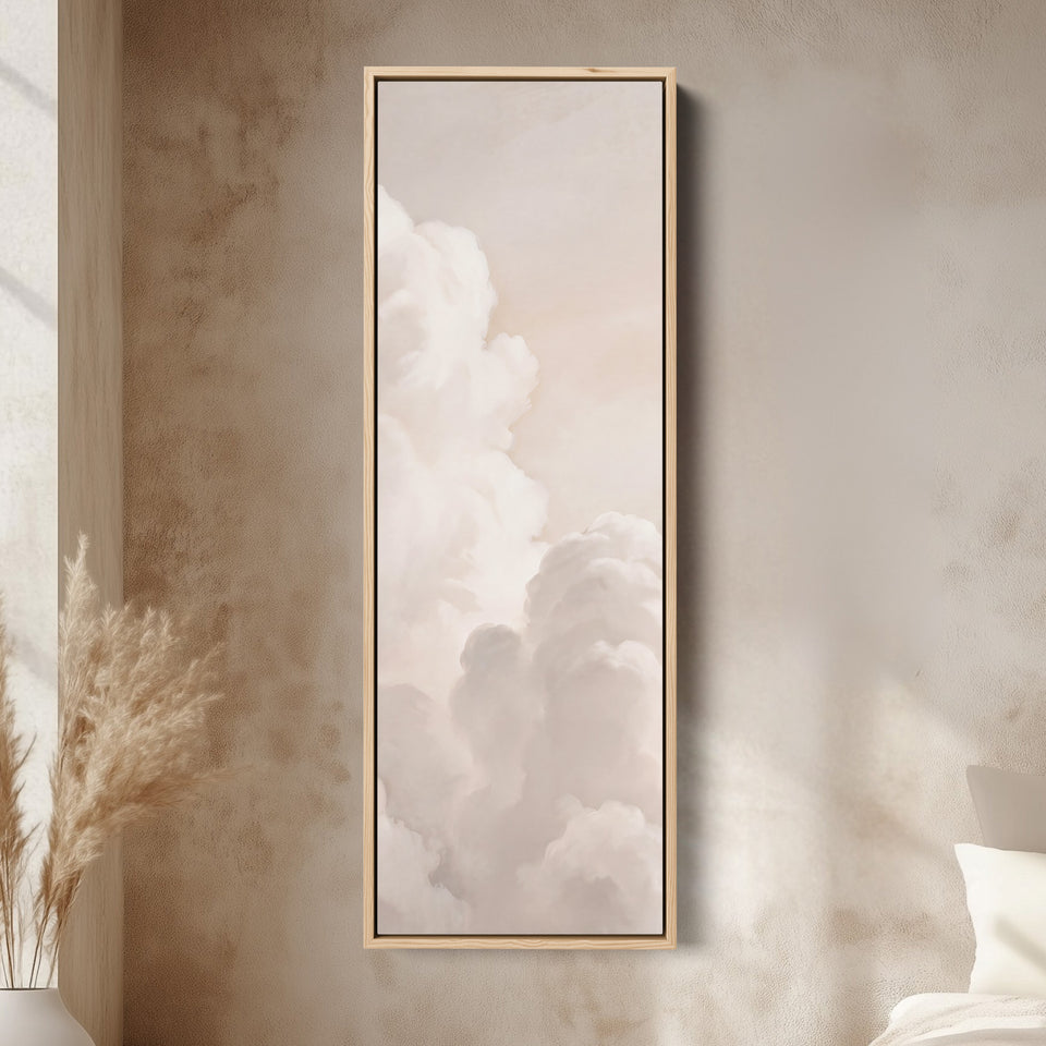 Soft Neutral Billowing White Clouds Tall Narrow Wall Art for Living Room canvas in an oak frame, above the bed in a modern bedroom