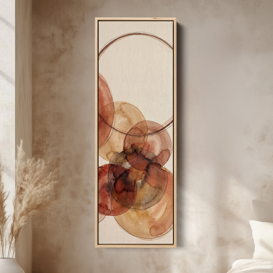 Warm Earthy Watercolor Circles Tall Narrow Wall Art for Living Room canvas in an oak frame, above the bed in a modern bedroom