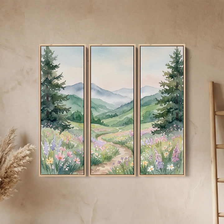 Wanddecoratieset van 3 voor de hal met een pad dat kronkelt door een bloemenvallei