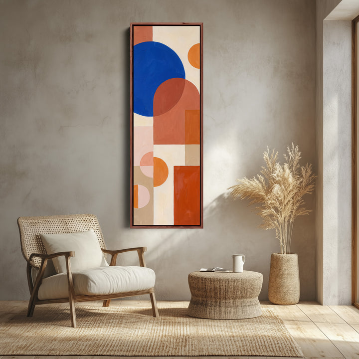 Kitchen Wall Art Tall Bauhaus Shapes in Cobalt and Orange canvas shown in a walnut frame