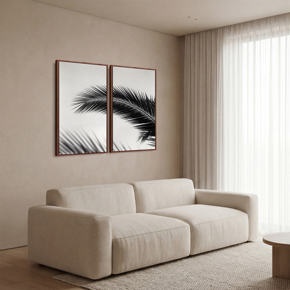 Wandbilder-Set aus 2 Teilen: Palmwedel vor strahlend weißem Himmel für ein Schlafzimmer