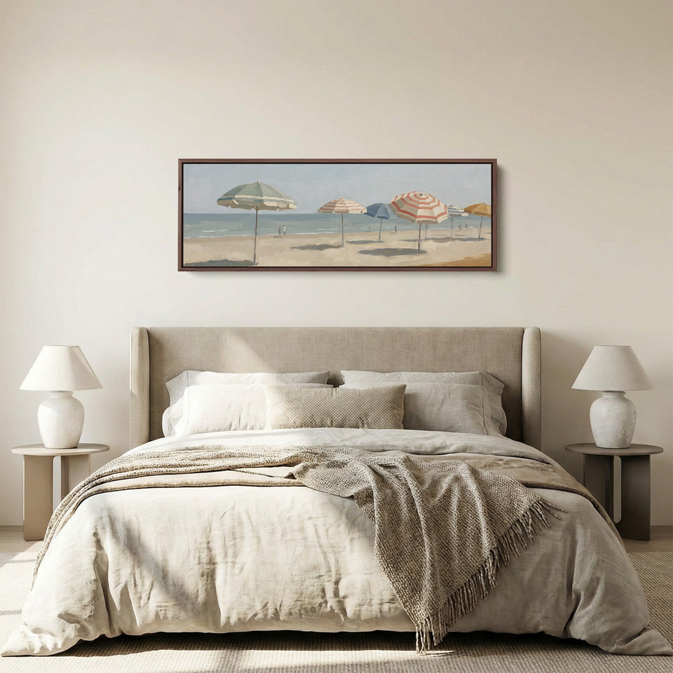 Living Room Wall Art Long Horizontal Canvas of Beach Umbrellas panoramic canvas in a walnut frame, above the bed