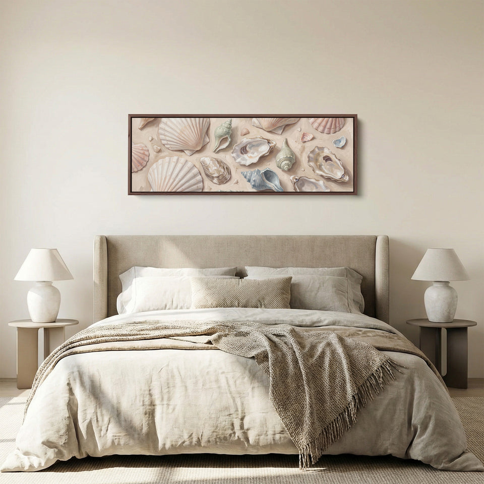 Long Wall Art Seashells on Sand Neutral Coastal Canvas for Above Bed panoramic canvas in a walnut frame, above the bed