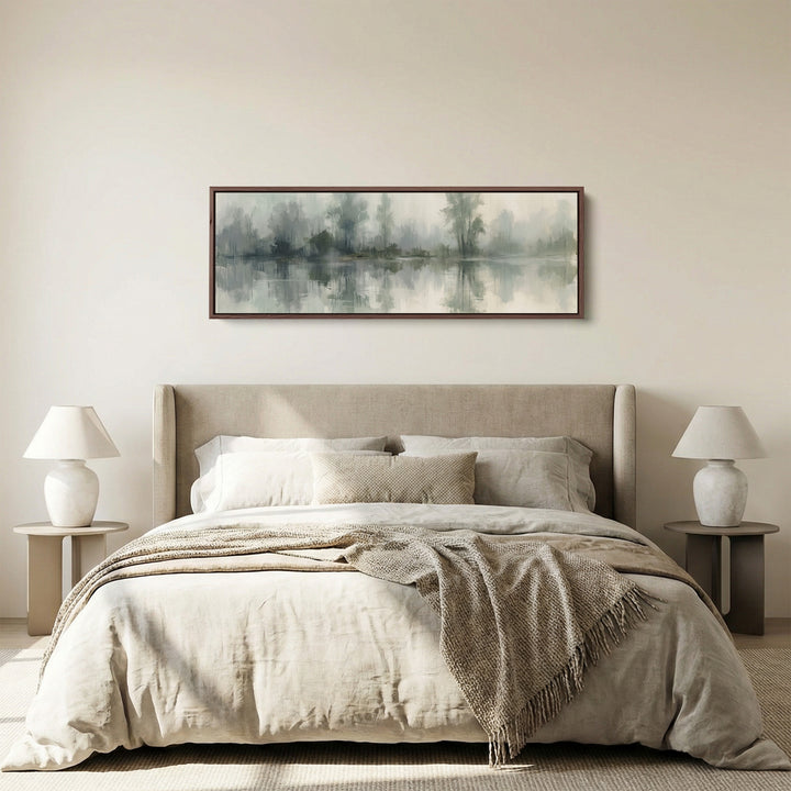 Above Couch Wall Art Long Misty Lake with Tree Reflections panoramic canvas in a walnut frame, above the bed