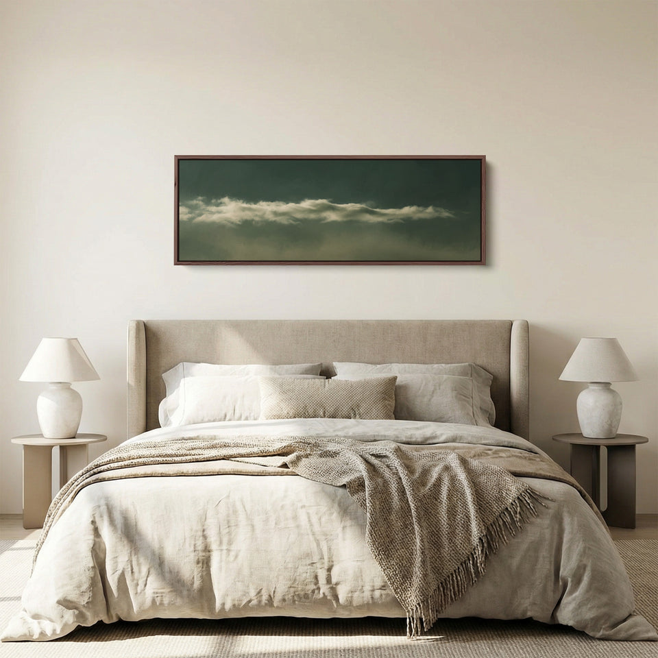 Living Room Wall Art Long Narrow Cloud Band on Dark Green Minimalist panoramic canvas in a walnut frame, above the bed
