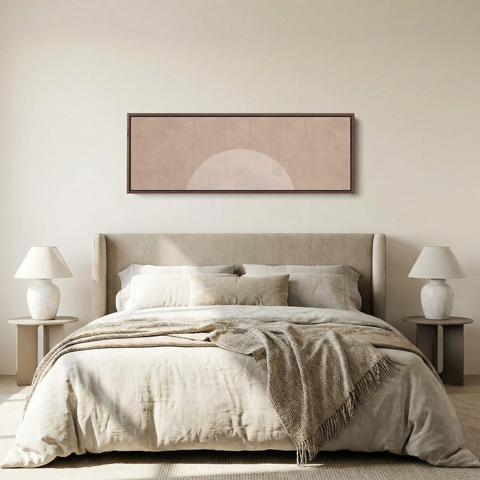 Panoramic Wall Art Blush Rising Moon Minimalist for Bedroom panoramic canvas in a walnut frame, above the bed