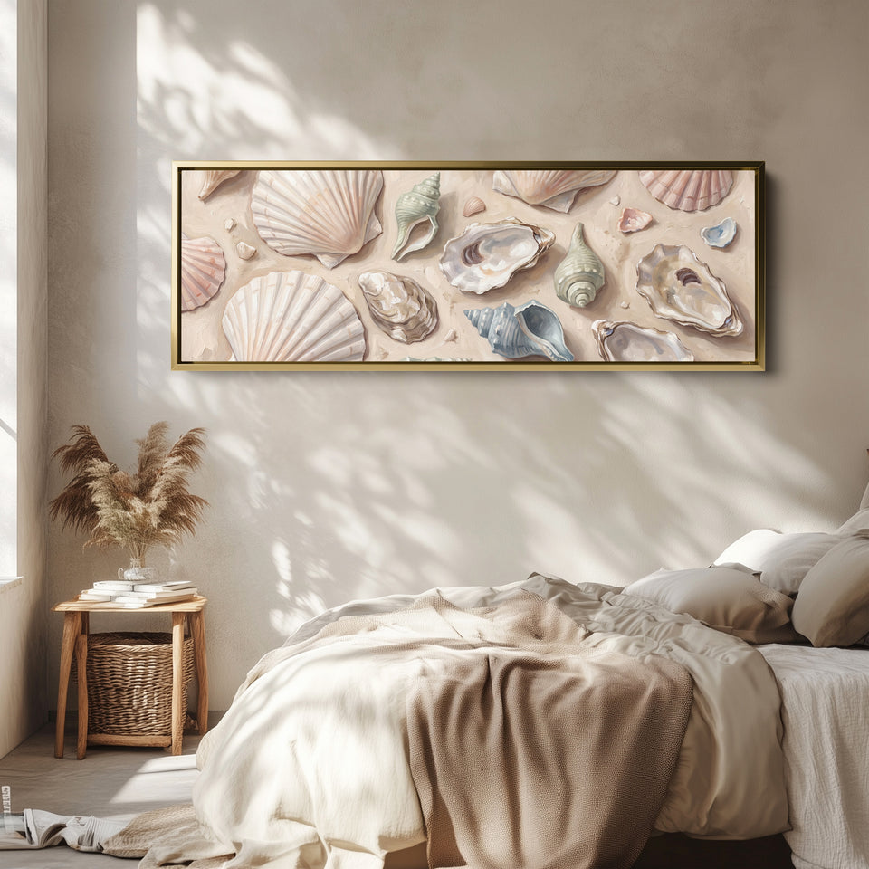 Long Wall Art Seashells on Sand Neutral Coastal Canvas for Above Bed wall art in a gold frame, above the bed