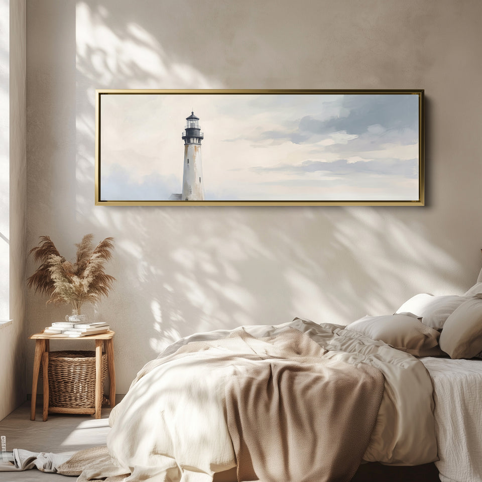Hallway Wall Art Long Narrow Minimalist Lighthouse Under a Grey Sky wall art in a gold frame, above the bed