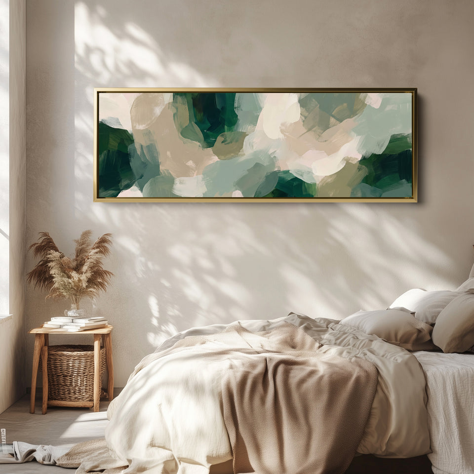 Bedroom Wall Art Panoramic Green Brushstroke Abstract Canvas wall art in a gold frame, above the bed