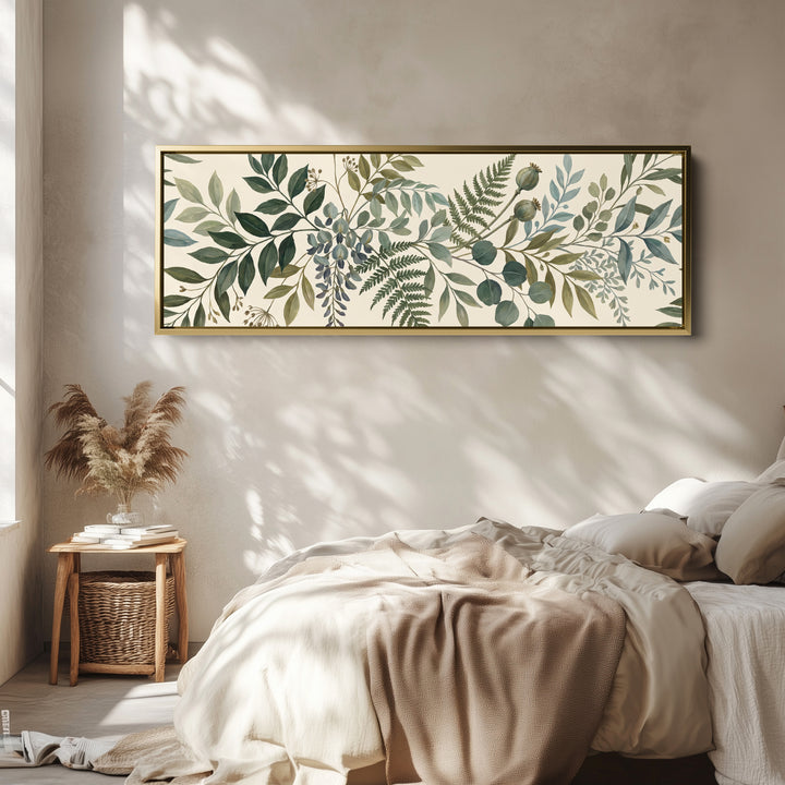 Dining Room Wall Art Long Horizontal Fern and Eucalyptus Botanical wall art in a gold frame, above the bed