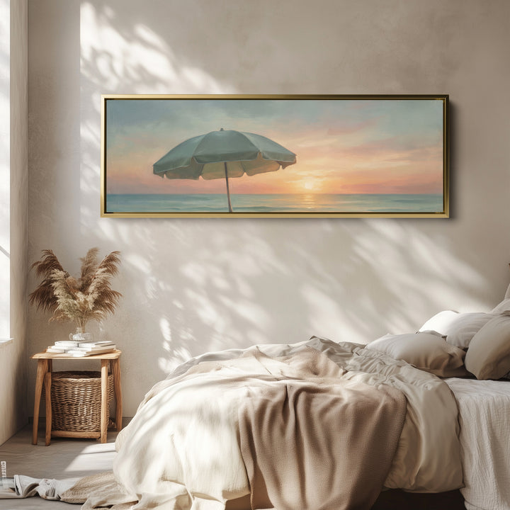 Calm Seaside Beach Umbrella at Sunset Panoramic Wall Art for Bedroom wall art in a gold frame, above the bed