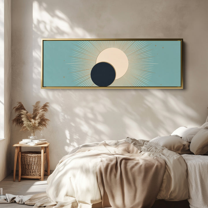 Horizontal Wall Art Aqua Celestial Eclipse Sun and Moon for Living Room wall art in a gold frame, above the bed