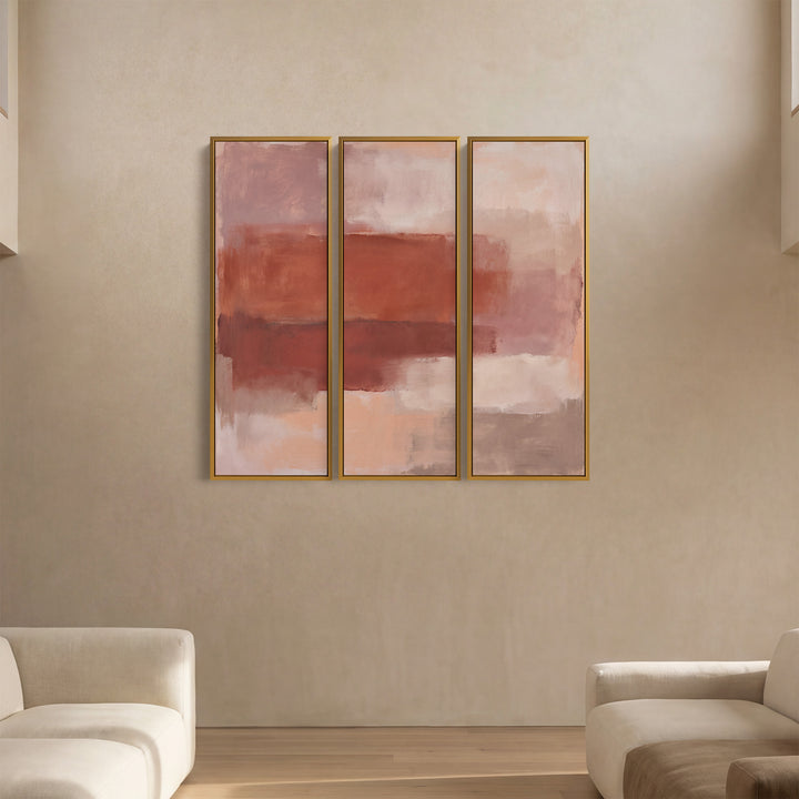 3-teiliges Wandkunst-Set mit rostrotfarbenen Bändern auf blassrosa Hintergrund für eine Bürowand