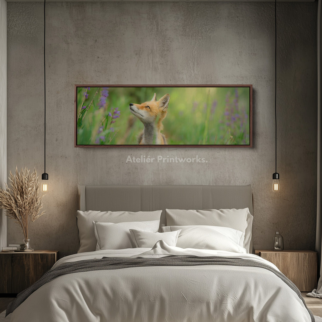 Above bed art fox in meadow looking upward among soft greenery for living room or bedroom