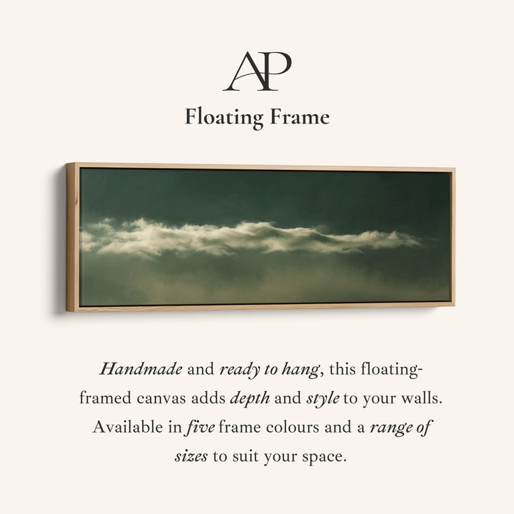 Corner detail of the Living Room Wall Art Long Narrow Cloud Band on Dark Green Minimalist canvas in a floating frame