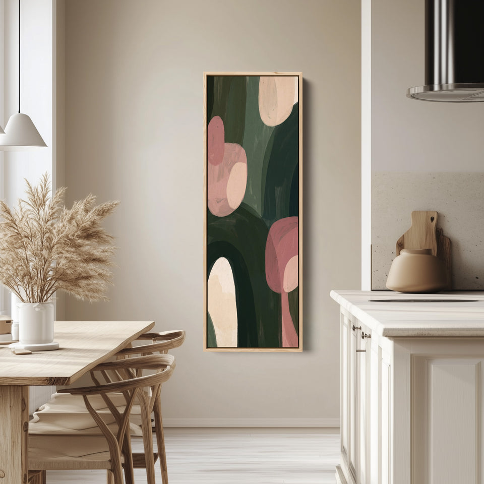 Living Room Wall Art Vertical Pink and Green Abstract Shapes tall canvas in an oak frame, hung in a bright kitchen