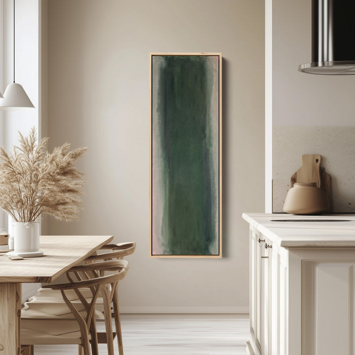 Vertical Wall Art Deep Green Colour Field Abstract for Office tall canvas in an oak frame, hung in a bright kitchen
