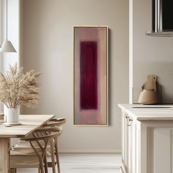 Tall Wall Art Burgundy Colour Field Abstract for Dining Room tall canvas in an oak frame, hung in a bright kitchen