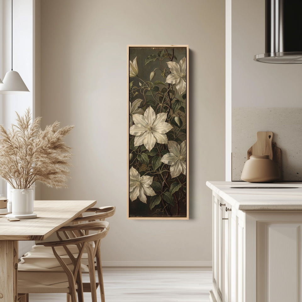 White Clematis on Dark Vertical Wall Art Vintage Botanical for Living Room tall canvas in an oak frame, hung in a bright kitchen