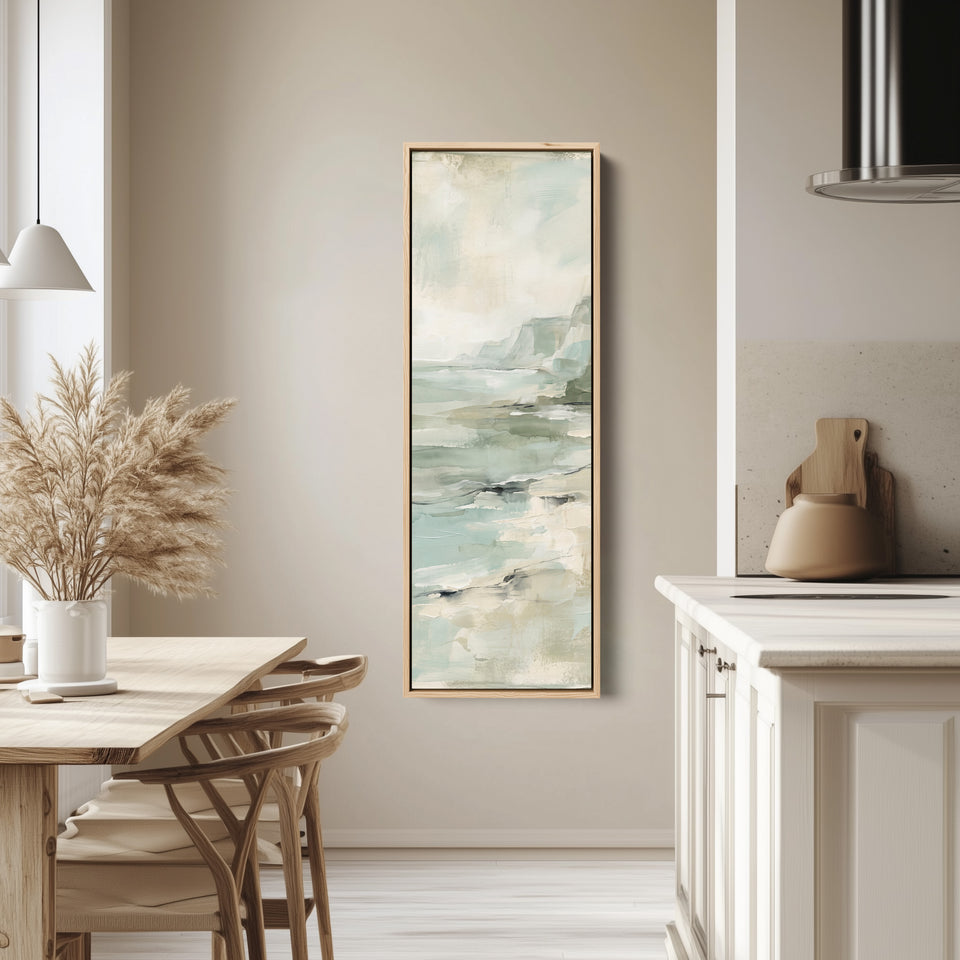 Calm Coastal Cliffs and Sea Tall Wall Art for Bedroom tall canvas in an oak frame, hung in a bright kitchen