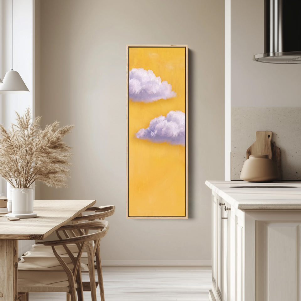 Vertical Wall Art Lilac Clouds on Yellow for Kids Room tall canvas in an oak frame, hung in a bright kitchen