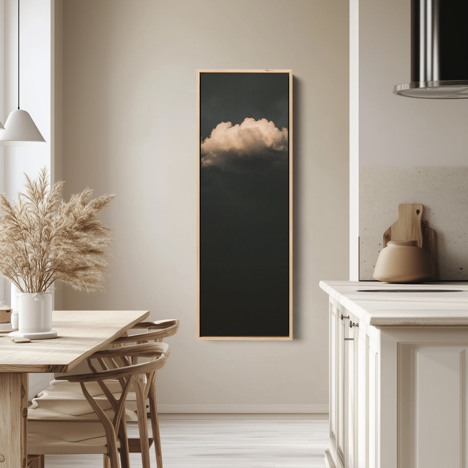 Tall Wall Art Single Cloud on Charcoal Minimalist for Office tall canvas in an oak frame, hung in a bright kitchen
