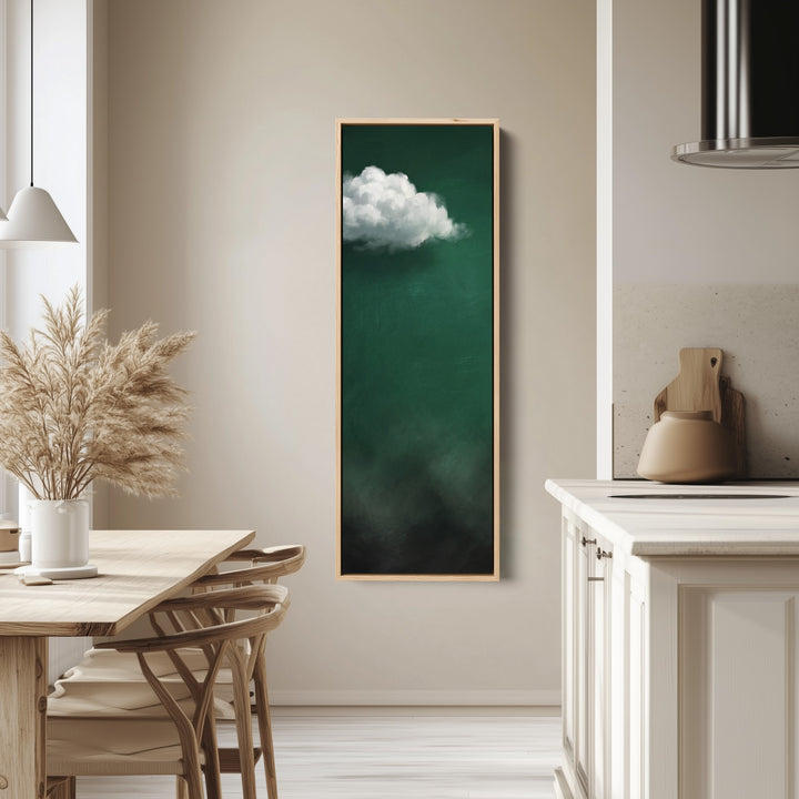 Living Room Wall Art Tall White Cloud on Emerald Green tall canvas in an oak frame, hung in a bright kitchen