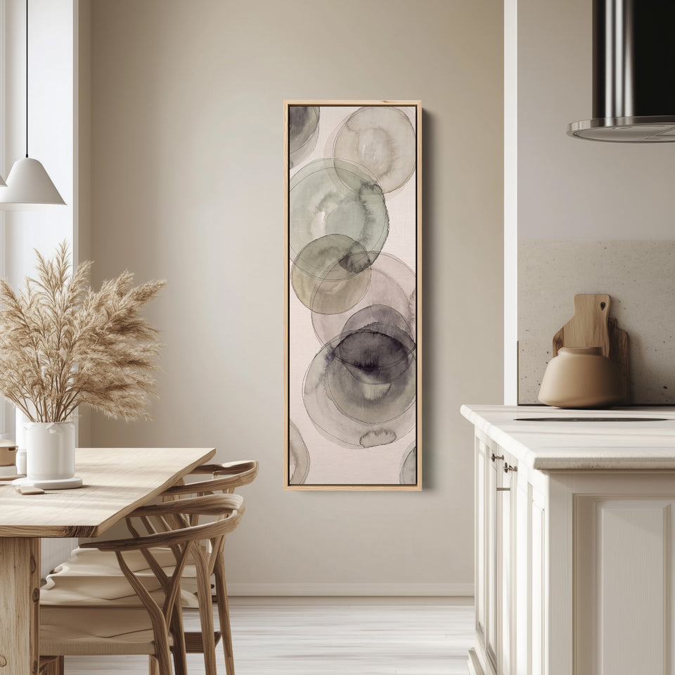 Office Wall Art Vertical Grey Watercolor Circles Abstract tall canvas in an oak frame, hung in a bright kitchen