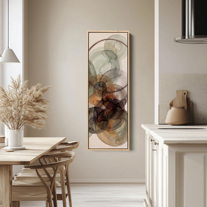 Tall Wall Art Rust and Sage Watercolor Circles Abstract for Dining Room tall canvas in an oak frame, hung in a bright kitchen