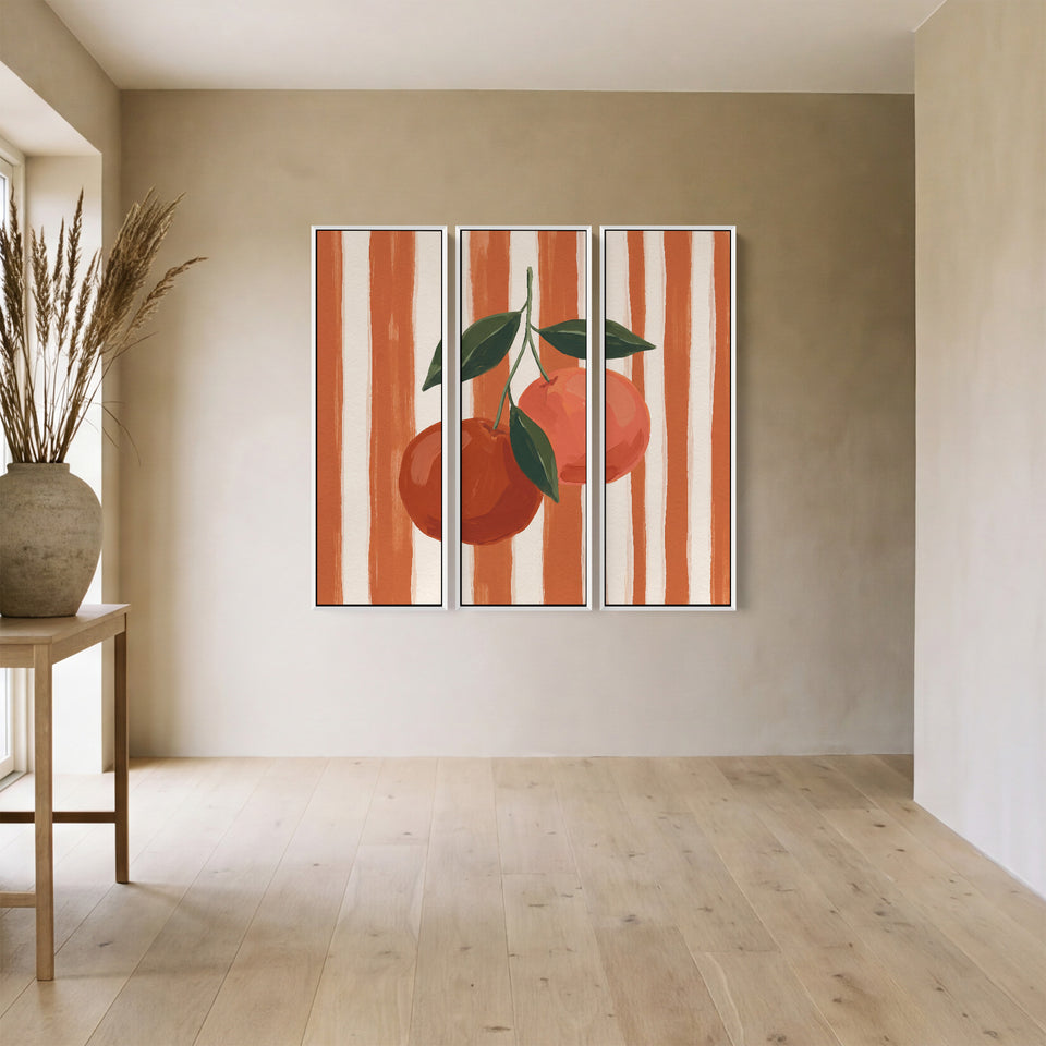 Tableau mural vertical en 3 parties représentant deux oranges sur un fond rayé, pour une cuisine