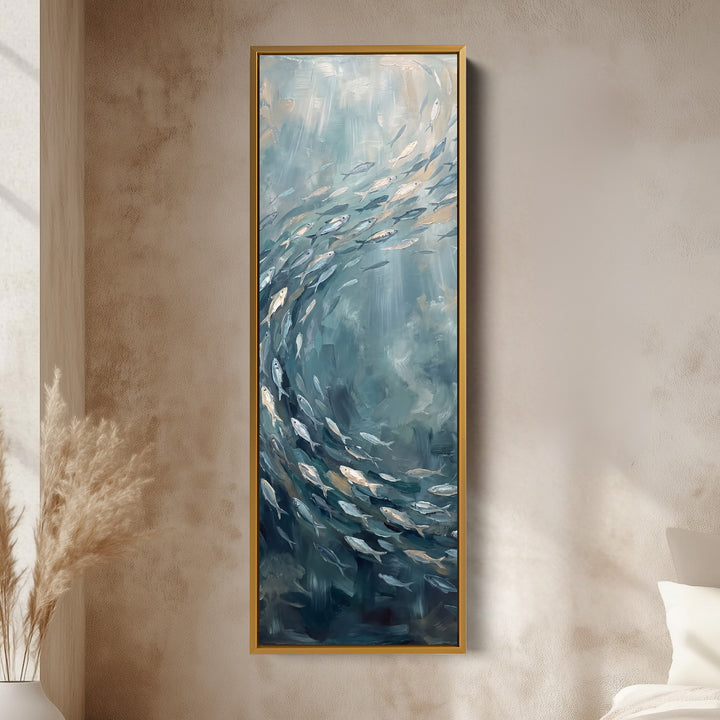 Vertical Wall Art Swirling Shoal of Fish Underwater for Hallway vertical wall art shown in a gold frame