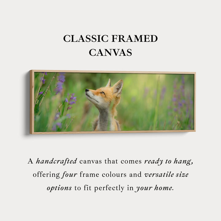 Above bed art fox in meadow looking upward among soft greenery for living room or bedroom