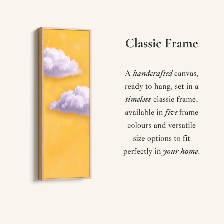 Corner detail of the Vertical Wall Art Lilac Clouds on Yellow for Kids Room canvas in a classic frame
