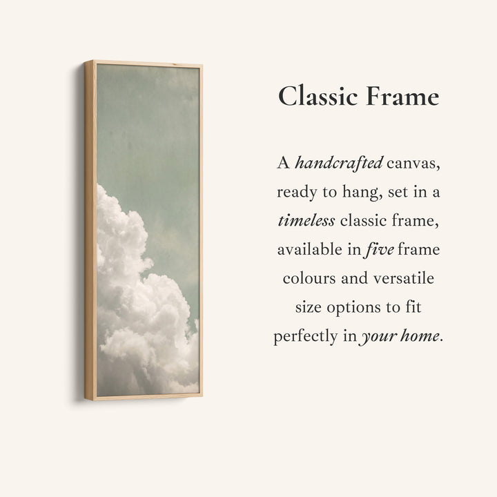 Corner detail of the White Clouds on a Sage Sky Vertical Wall Art for Living Room canvas in a classic frame
